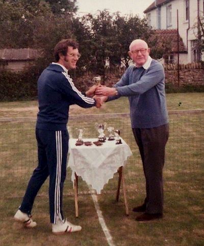 12. Men’s singles winner Jeff Davies and club president David Padfield on the grass courts off Cardiff Road in 1978 